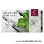 Preview: 5-Euro-Silbermünze Österreich 2014 mit Motiv ‚Glück zum Schenken‘, neuneckige Form, Handgehoben-Qualität im Originalblister mit Infofolder.