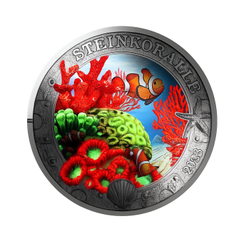 Preview: UV-leuchtende Rückseite der 3-Euro-Münze 2023 Steinkoralle bei Dunkelheit